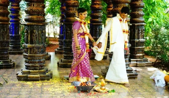 Couple performing Saptapathi during their wedding recreation at Elements Resort. Captured by Sidphoto.